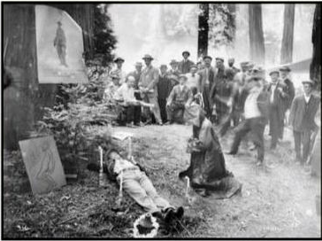 A 1915 photograph of a Bohemian Club ceremony at the Grove, robed figures gathered among the redwoods